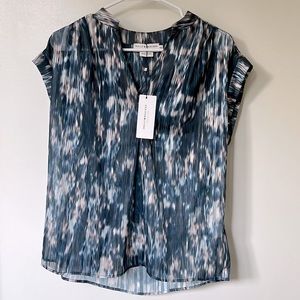 Never been worn. Runs big